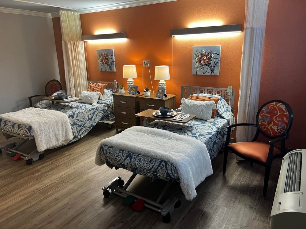Room with two beds and white furniture, showcasing the nursing in Shreveport, LA