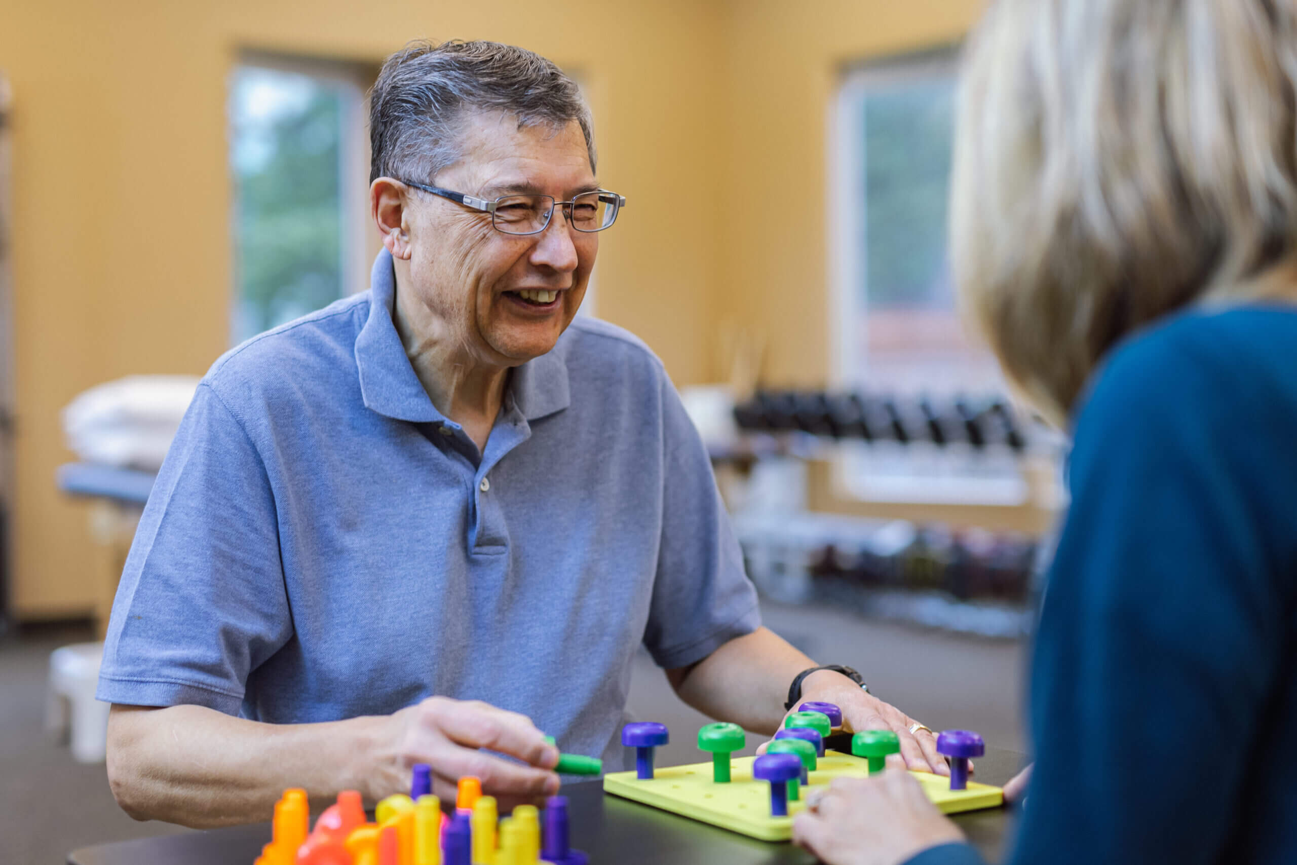 Occupational Therapy with patient engaging in hand coordination activity in Shreveport, LA