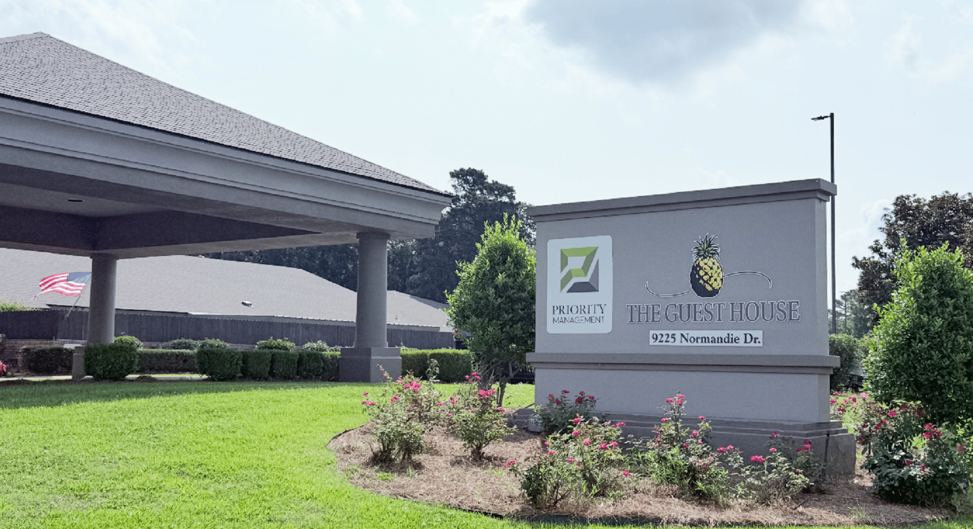 The Guest House Exterior Sign